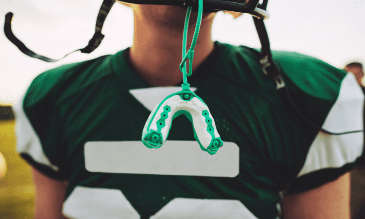 A custom mouthguard offers a superior solution for athletes, ensuring a perfect fit and maximum protection.